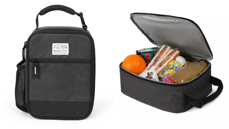 A black reusable lunch bag with food inside of it.