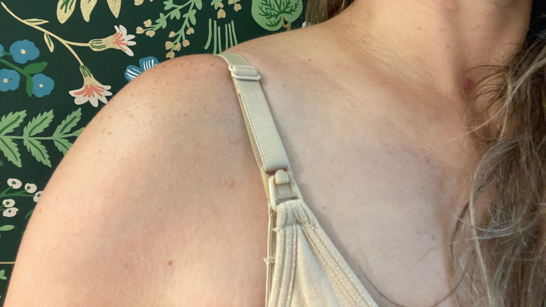 Writer, Rachel Murphy's shoulder, showing the strap of a Skims Fits Everybody Maternity Nursing Scoop Bralette.