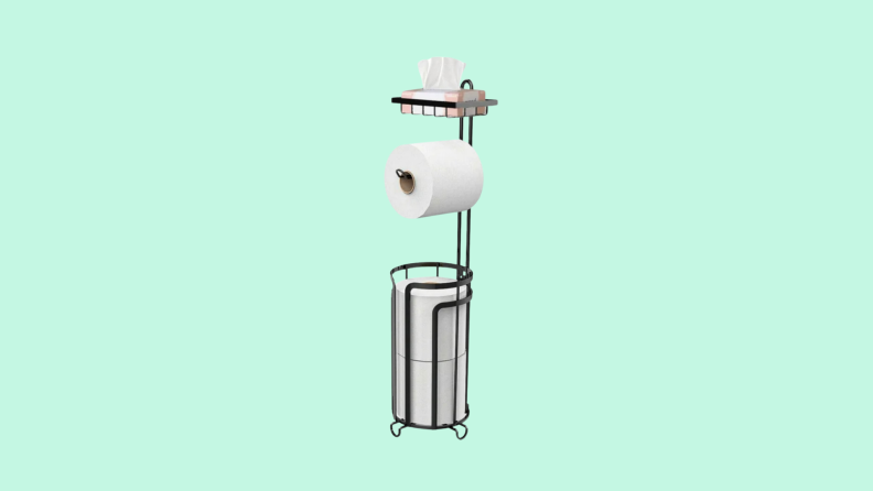 The Techvida Bathroom Tissue Paper Roll Stand in front of a background.
