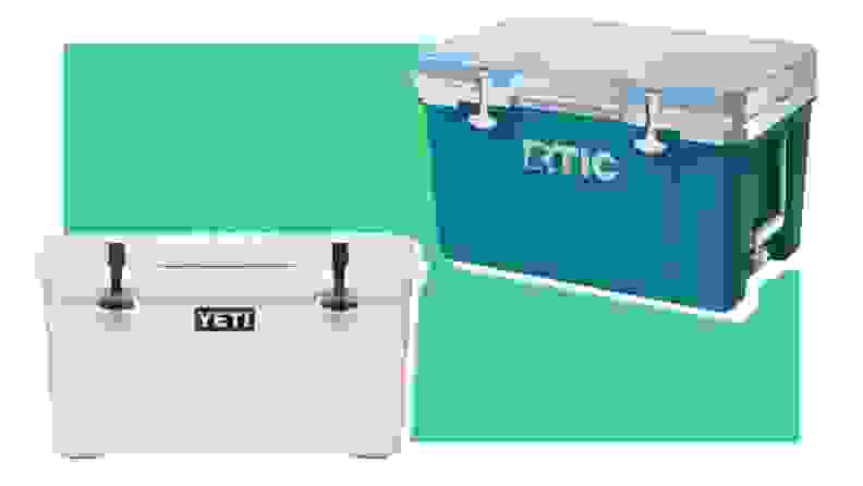 A white Yeti cooler next to a blue RTIC cooler on a green background.