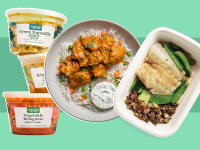 Several packaged meals on a green background