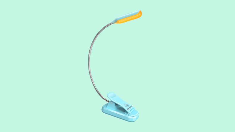 A reading light on a green background.