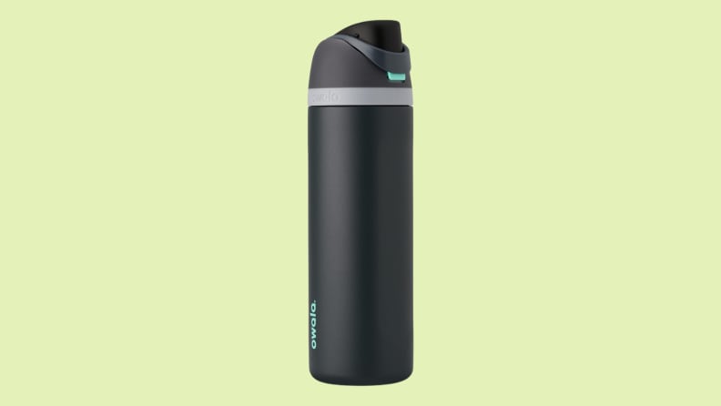 Water bottle against green background