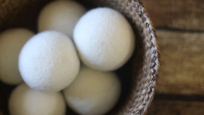 white dryer wool balls in basket