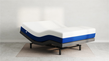 An Amerisleep AS3 mattress in an empty room.