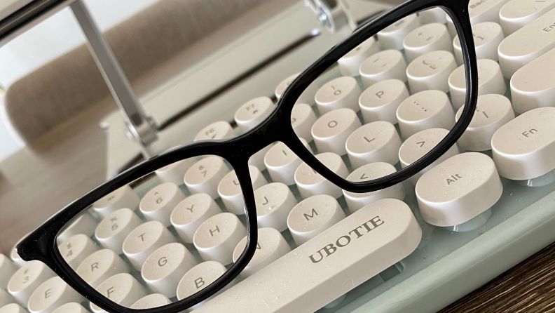 A pair of Felix Gray glasses on top of a laptop.