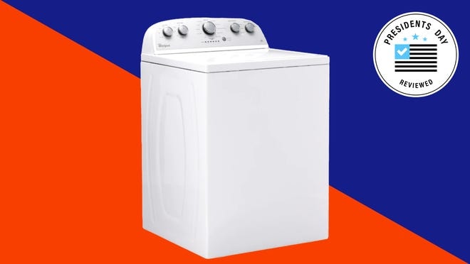 A white washing machine against a red and blue background.