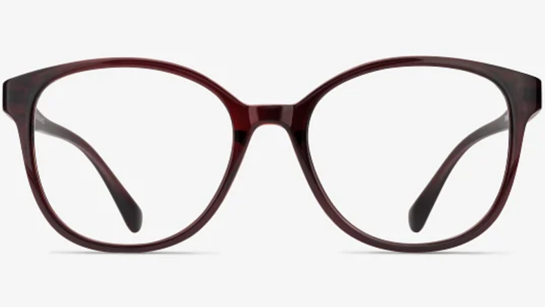 Brown-framed glasses on gray background