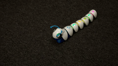 The Code-a-Pillar moves around on the ground.