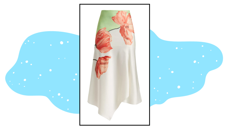 A cream-colored satin skirt with a green and orange floral print.