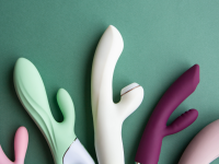 Five dildos on a green background