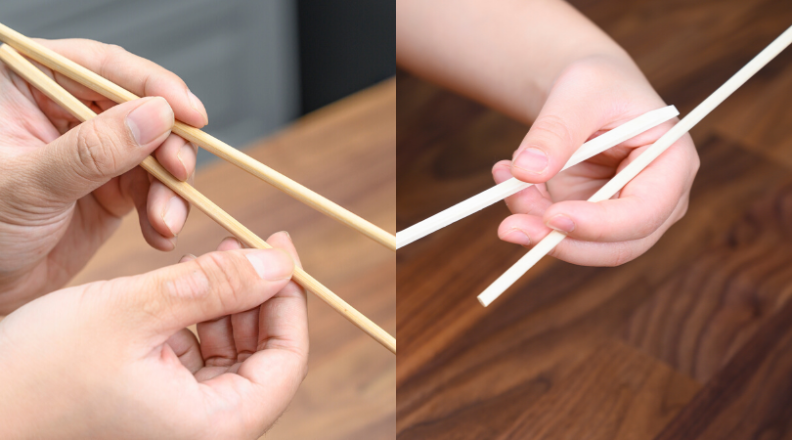 Slide in the second chopstick between right finger and middle finger.