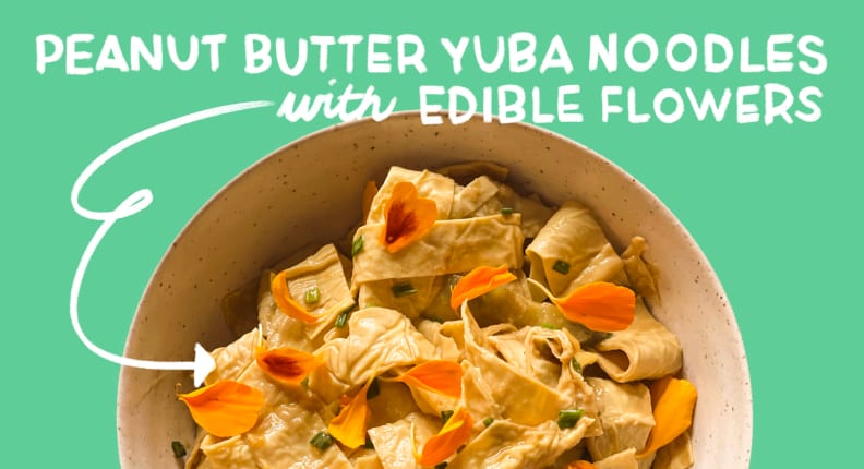 A bowl of yuba noodles on a green background