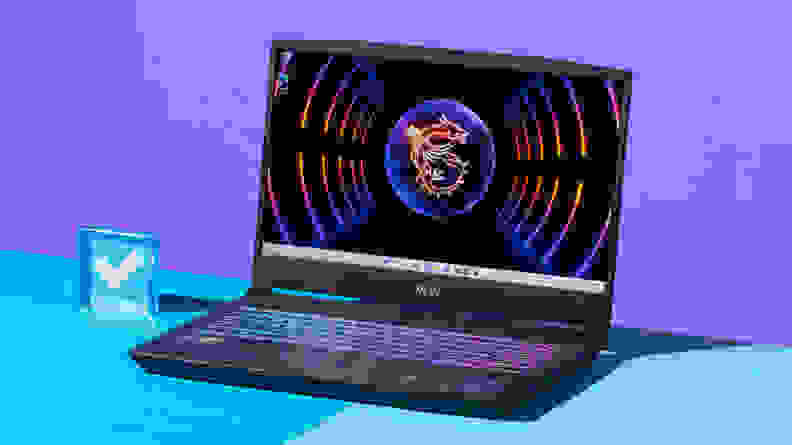 An open and powered on black laptop with a neon-lit keyboard against a purple and blue backdrop.