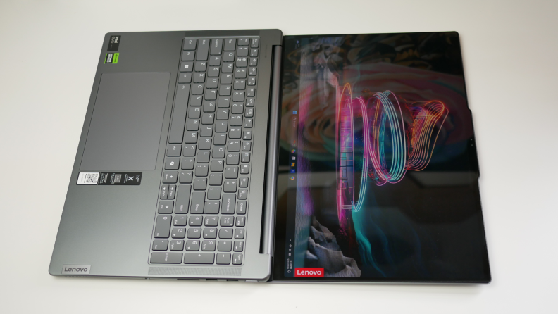 The laptop fully open in 180 degrees flat.