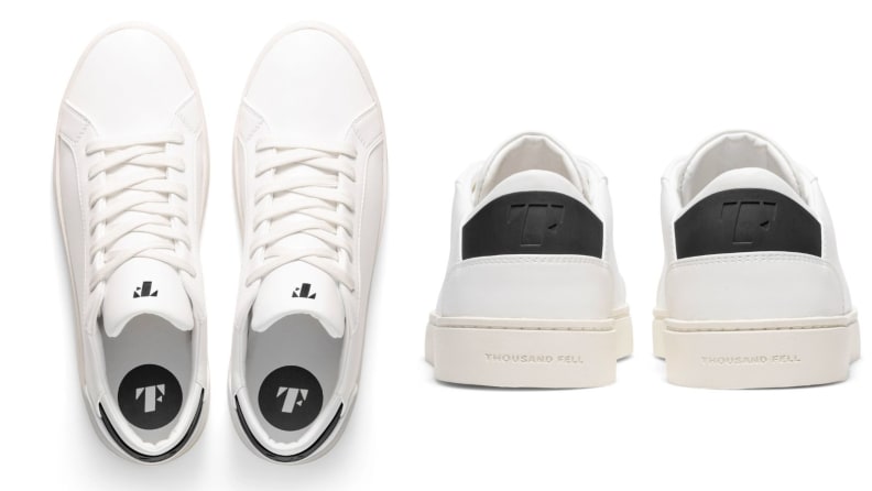 Pair of Thousand Fell Lace Up sneakers with black accents.