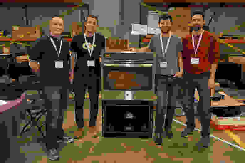 The Roasters team with their House Roast coffee roasting oven