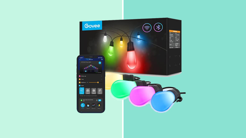 Govee smart String lights displaying pink and blue next to a cell phone