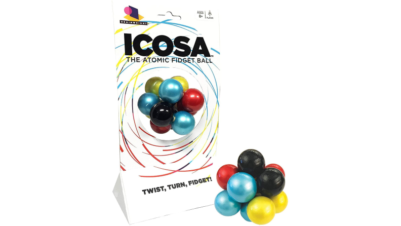 An atomic puzzle ball sits with its packaging.