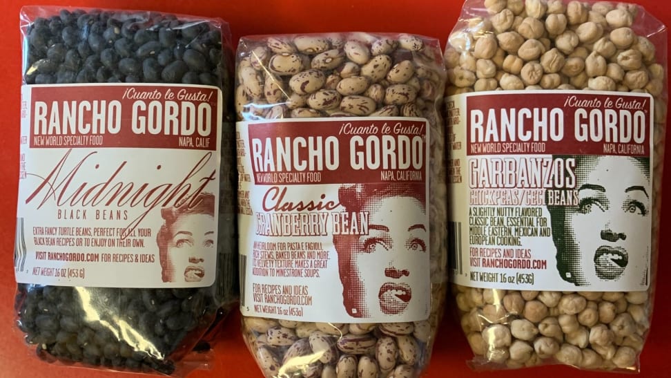 Three bags of dried beans, from left to right: black beans, cranberry beans, and chickpeas.