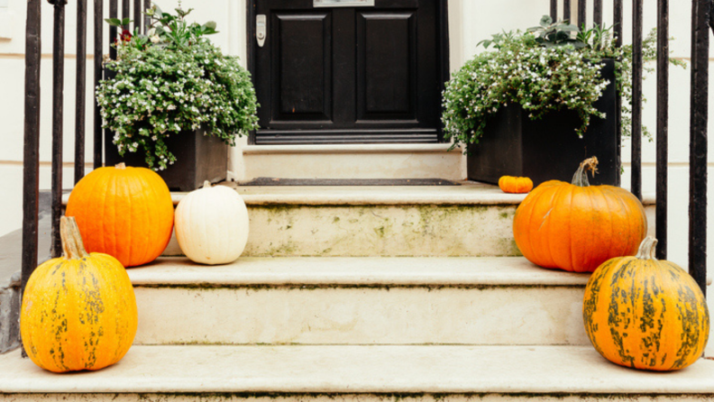 Pumpkins on front porch stairs