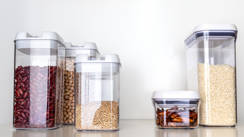 Air-tight food storage containers against a white background.