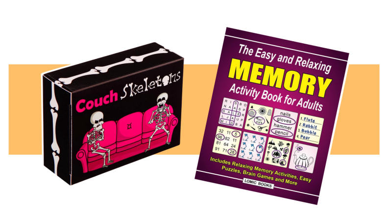 The Easy and Relaxing Memory Activity Book for Adults next to the Couch Skeletons game box on an orange background.