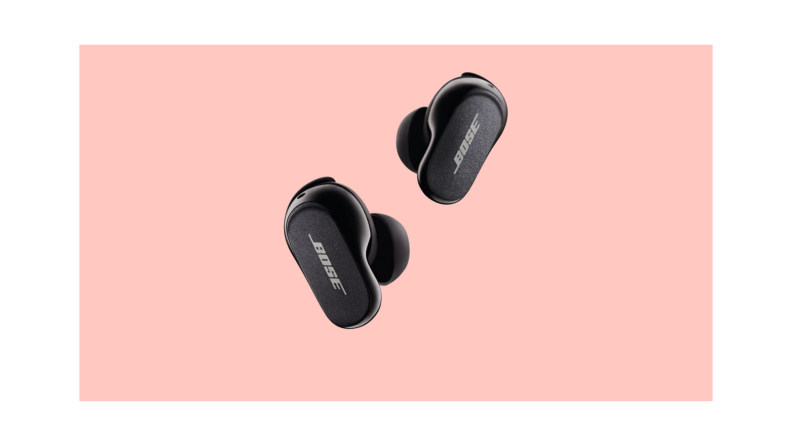 a pair of bose noise-cancelling earbuds on a colorful background