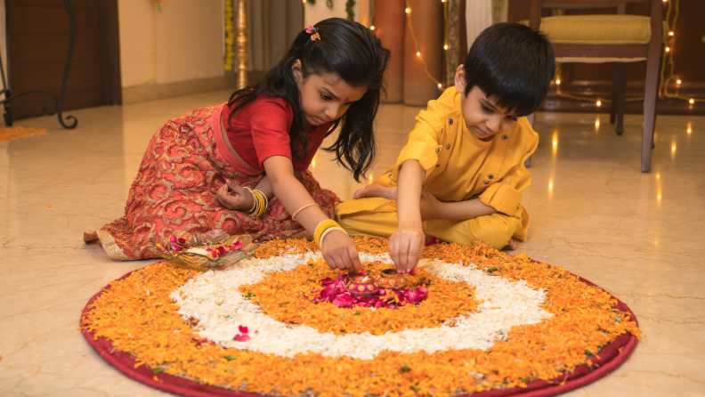 Children making rangoli