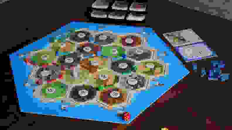 Catan is a German-style board game that's played with three or four people.