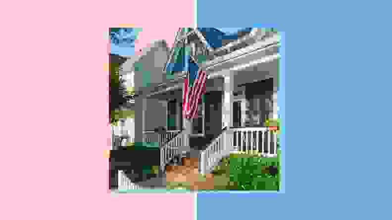 A house with an American flag hanging from the front.