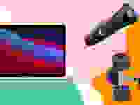 A laptop, electric shaver, and weights against a colorful background.