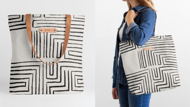Two images of the same tote bag in a black and white geometric pattern. The first image features the bag standing upright, the second features someone holding the bag.
