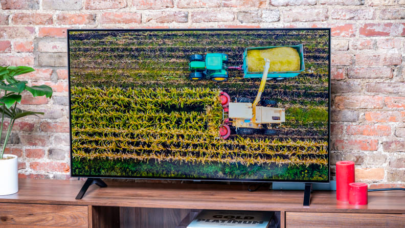 The LG A1 OLED TV displaying 4K content in a living room setting