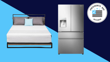 A bed with mattress and a refrigerator on a two-tone blue background