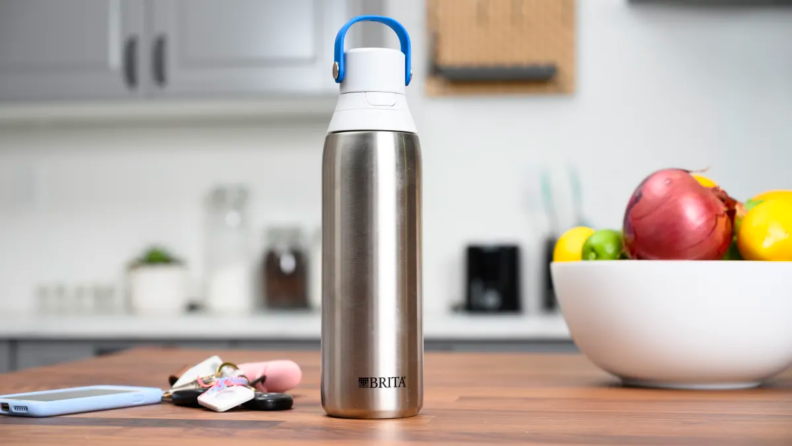 A Brita water bottle on a countertop.