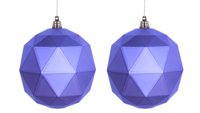 Two purple Christmas ornaments.
