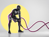 man using battle rope