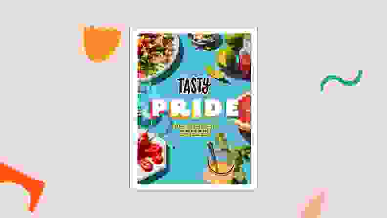 The Tasty Pride cookbook against a light pink background.