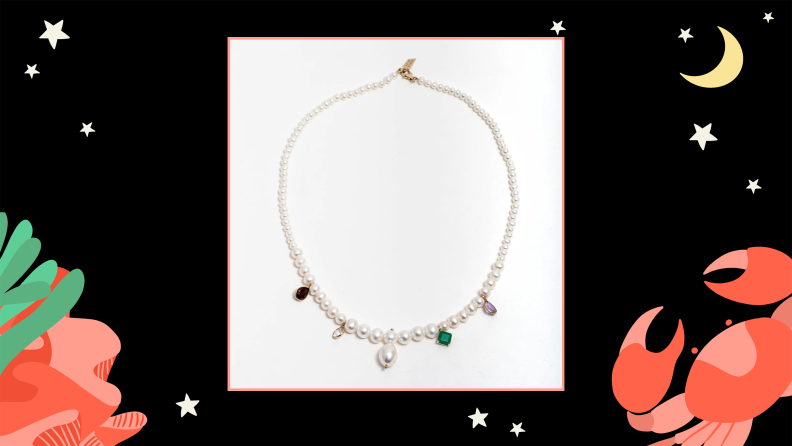 A pearl necklace with gemstone pendants.