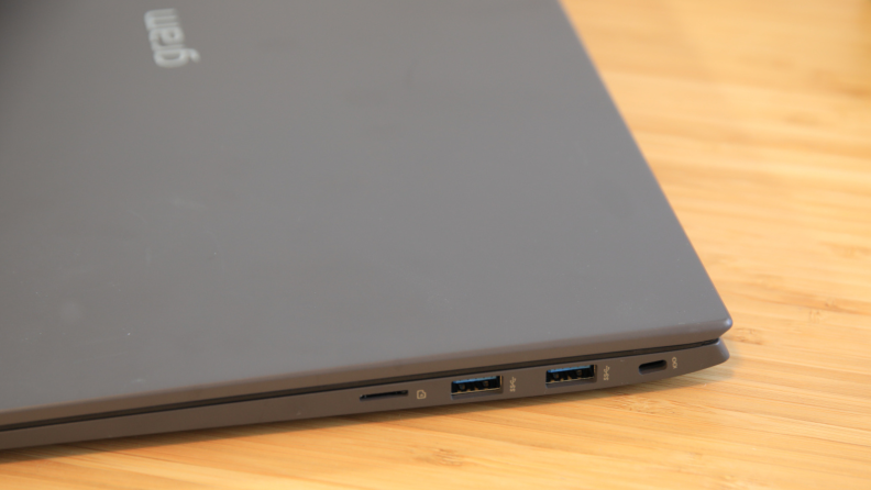Close up of USB ports on the side of  a laptop computer.