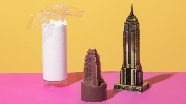 Cardboard being held over top of tube.