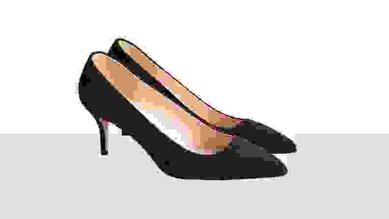 Black suede close-toed heels.