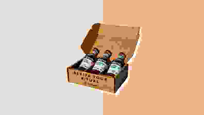 A box of the Daysie Trio syrups opened to reveal three bottles of coffee syrups.
