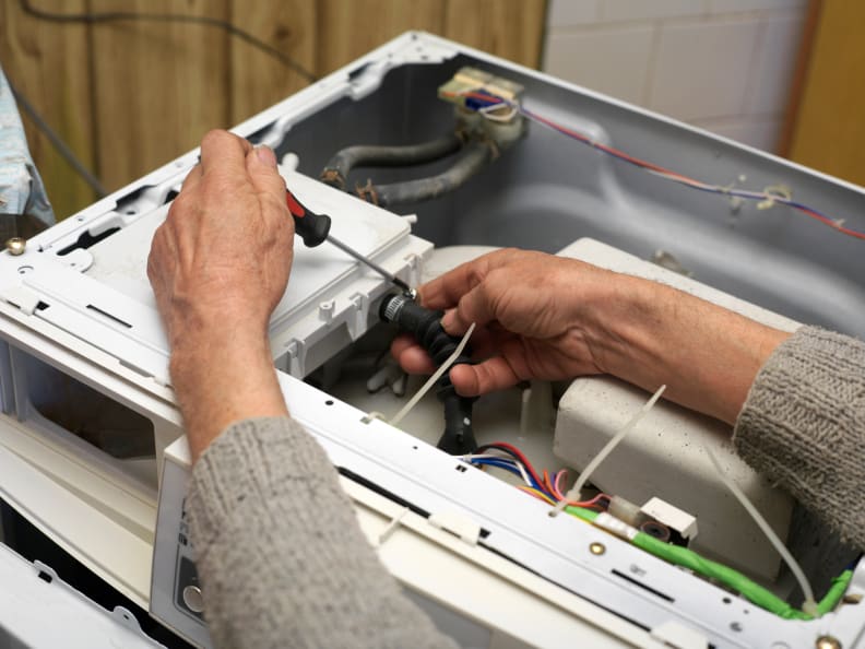 Repairing a washing machine at home