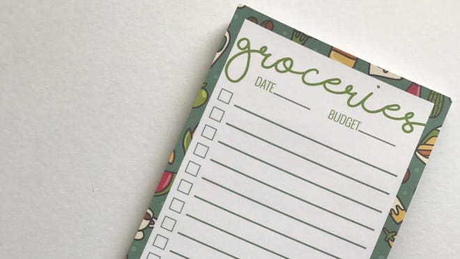 A grocery list notepad.