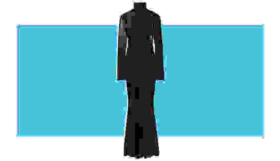 A black velvet maxi dress with long sleeves.