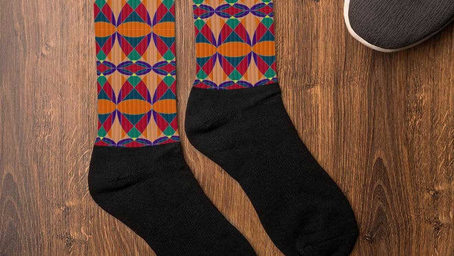 Socks with black feet and primary-color-printed ankles.