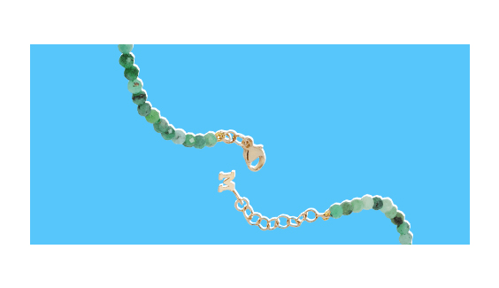 Close-up of a green necklace.