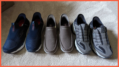 Three different pairs of the Sketcher Slip-Ins on carpet.
